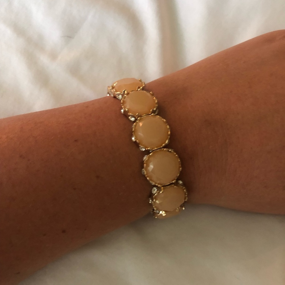 Peach and gold bracelet
